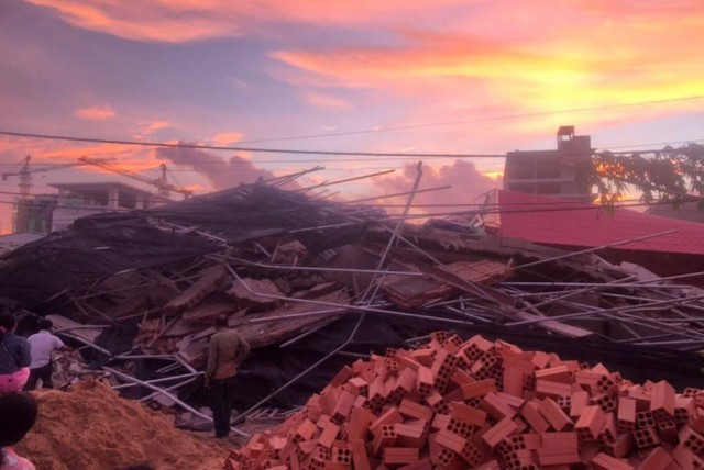At least 3 dead, over dozen trapped as under-construction building collapses in SW Cambodia