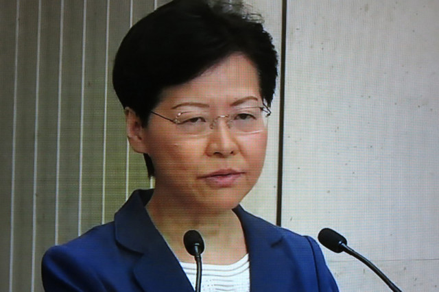 When will you die?' Hong Kong leader grilled at press conference