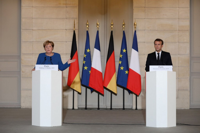 Macron, Merkel meet to harmonise positions before EU summit