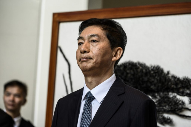 'Return to right path' Beijing's new envoy tells Hong Kong