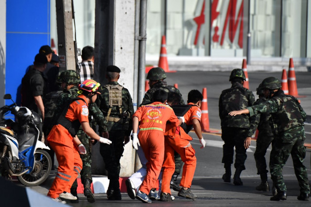 Thai soldier holds out in mall after killing 21 in mass shooting
