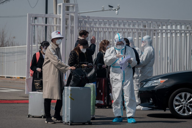 China tightens quarantine for international arrivals
