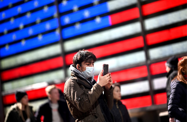 Americans urged to wear masks as virus toll mounts around world