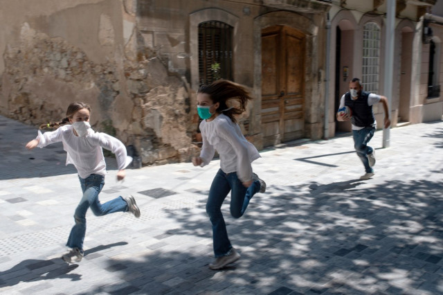 'We're going out!': Spanish kids reclaim streets after weeks indoors