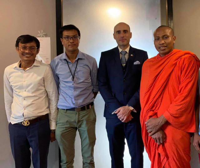 A Youth Leader and a Buddhist Monk Are Arrested and Charged over Plans to Hold a Demonstration