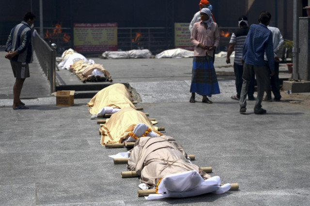 India Covid-19 deaths surge again, more global aid flown in