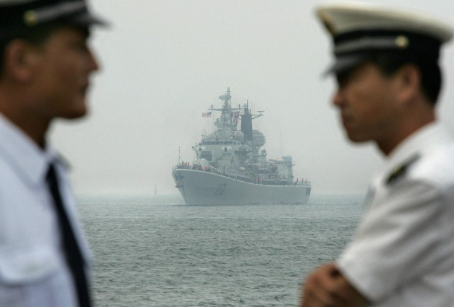 China says US 'creating risks' with South China Sea warship sail-bys
