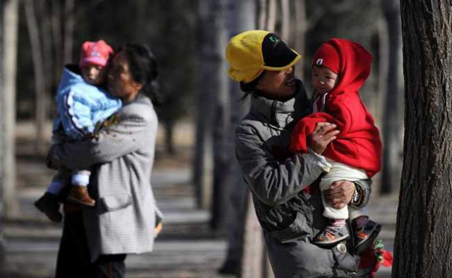 China allows couples to have three children: state media