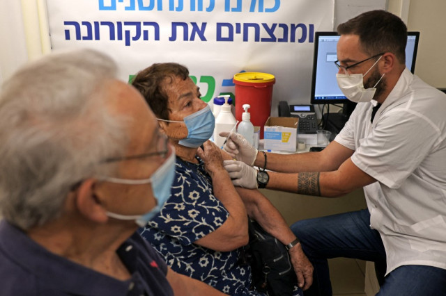Israel begins Covid booster shots for over 50s