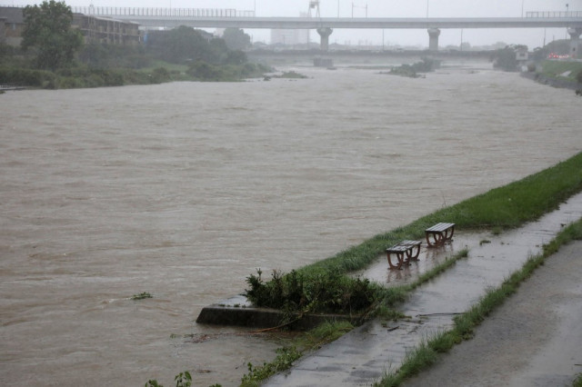 Heavy rain triggers floods, landslides in Japan