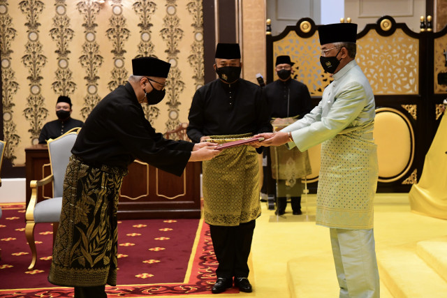 Malaysian PM sworn in as scandal-hit party reclaims leadership