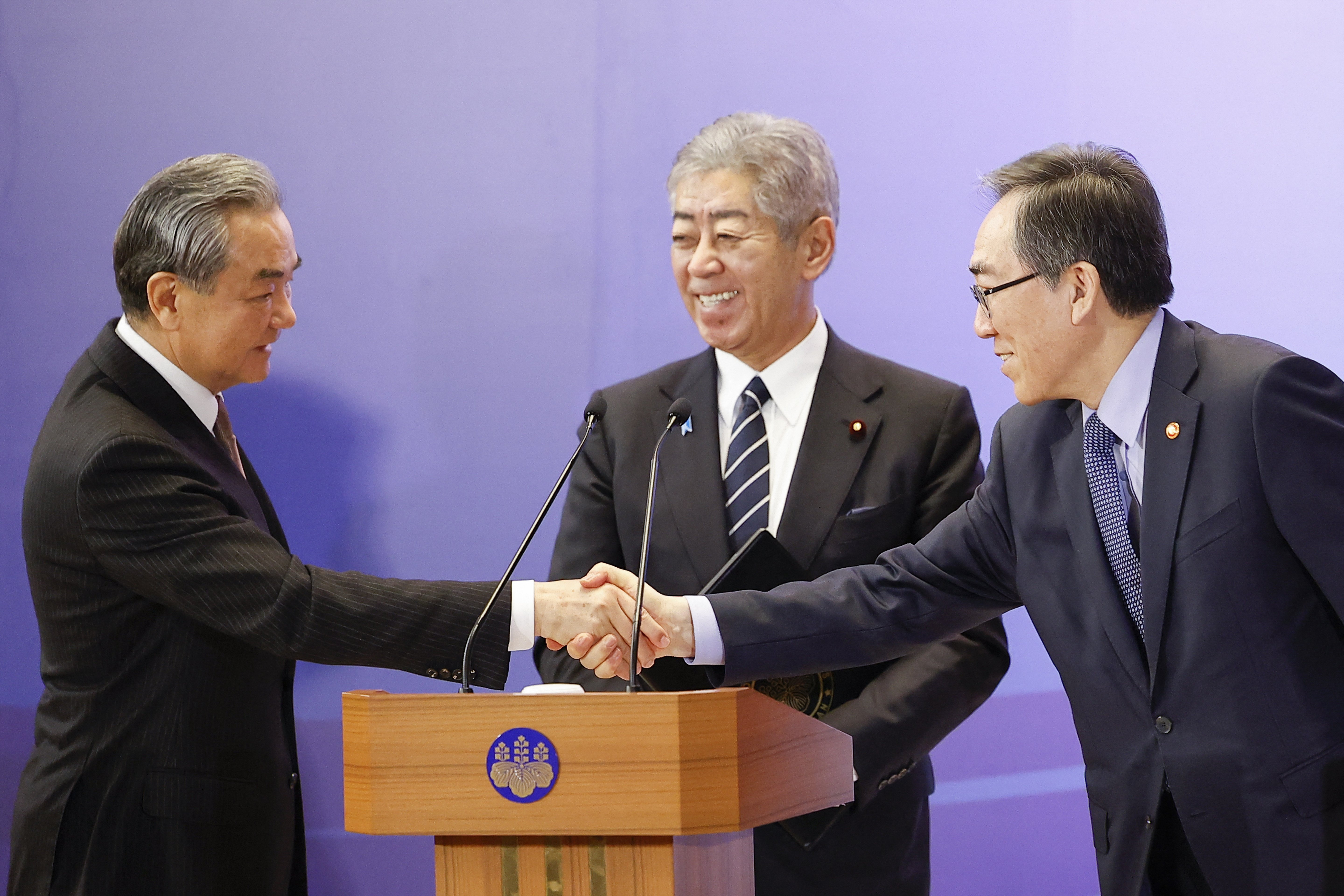 China, Japan, ROK Agree to Enhance Mutual Trust, Deepen Cooperation: Wang Yi